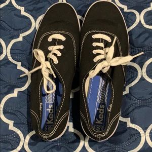 Keds Women’s Black Canvas sneaker in size 9.